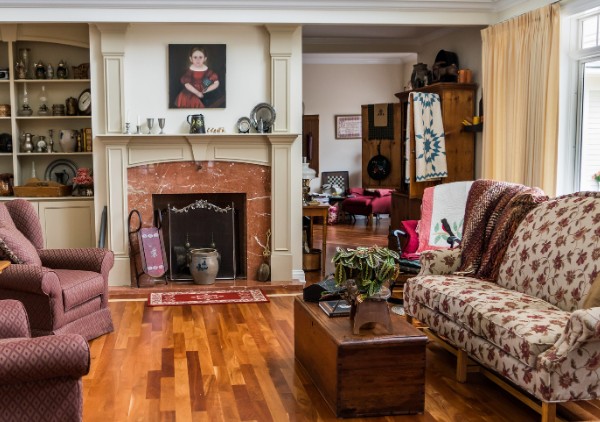 A warm, lived-in living room staged for an estate sale